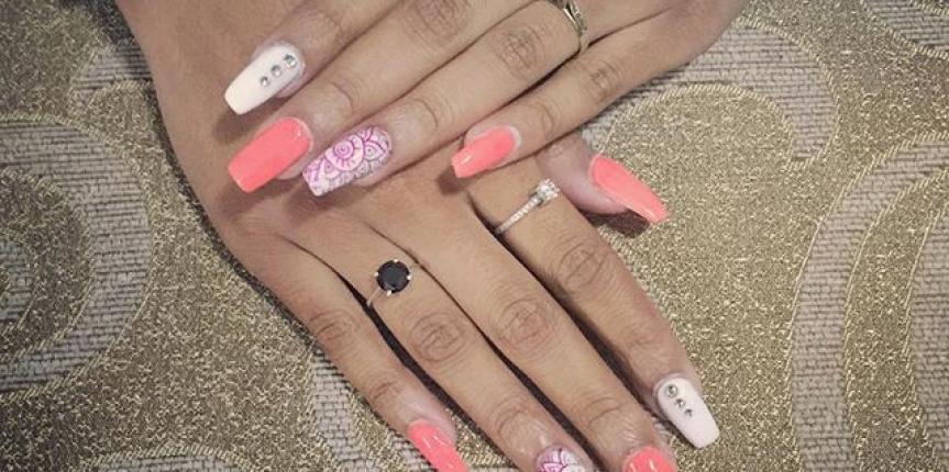 Pink acrylic nails with accent nail